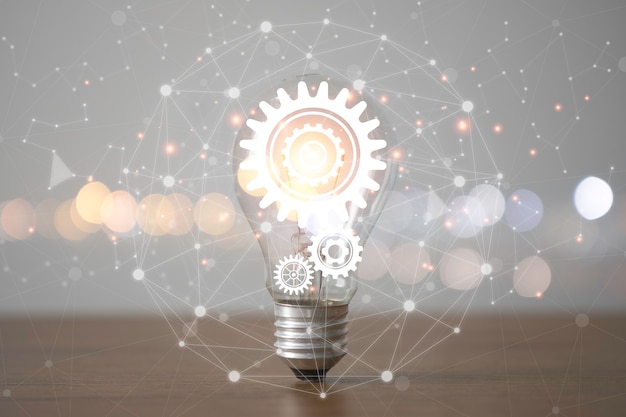 Ampoule avec pignons et ligne de connexion. Concept d'idée de pensée créative.