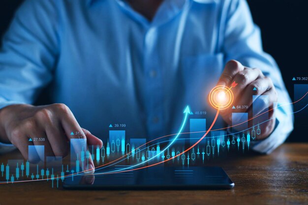 Photo analyse des bénéfices de l'entreprise. l'homme d'affaires analyse les tendances du graphique des profits. il fait des investissements.