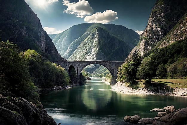 Un ancien pont de pierre sur une rivière de montagne dans les montagnes sur fond de ciel