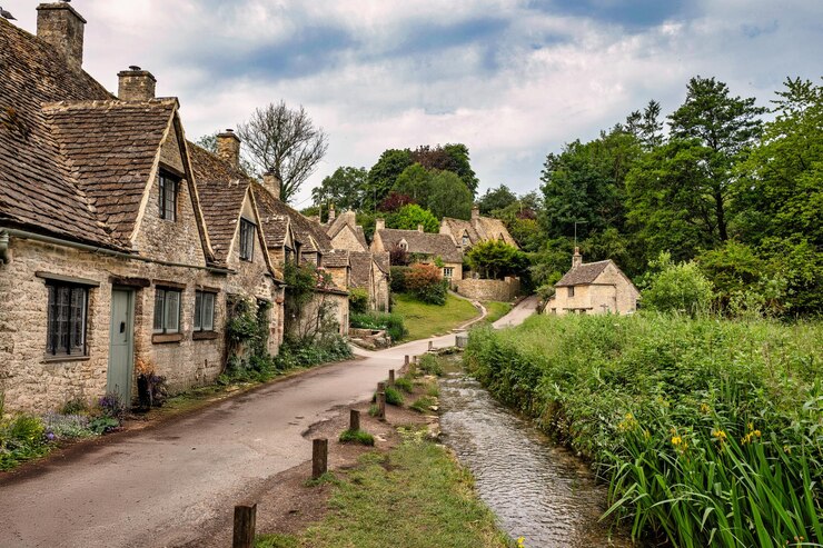 Photo anciennes maisons dans le village anglais de cotswolds bibury angleterre