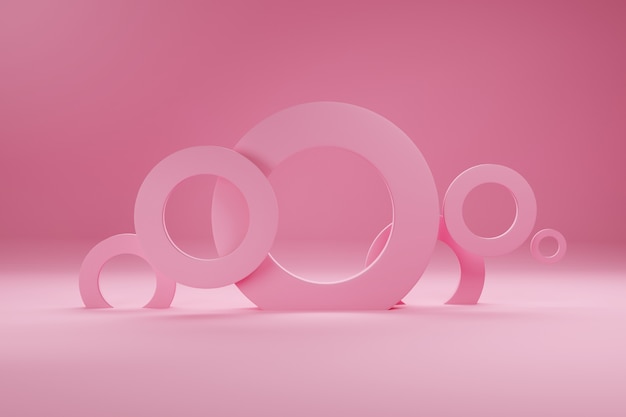 Anneaux de couleur rose, pour bannière ou affiche. Le minimalisme, les formes géométriques abstraites et les formes rendent l'arrière-plan 3D.