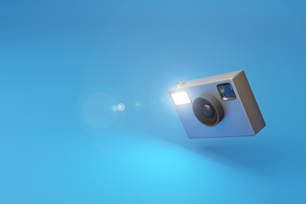 Appareil photographique vintage tirant le flash sur un fond bleu.