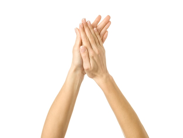Applaudir les mains Main de femme avec manucure française gesticulant isolé sur fond blanc Une partie de la série