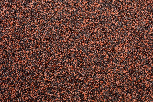 Photo application décorative de plâtre à grains orange et noir