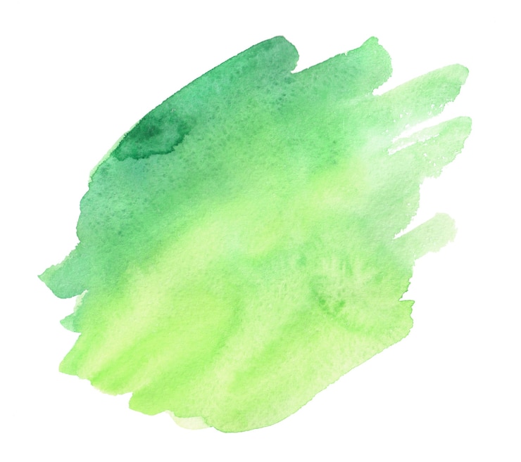 Photo aquarelle abstraite verte et jaune sur blanc. éclaboussures colorées sur papier.