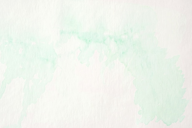 Aquarelle abstraite verte texturé sur fond de papier blanc