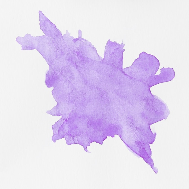 Photo aquarelle éclabousse violet sur fond blanc