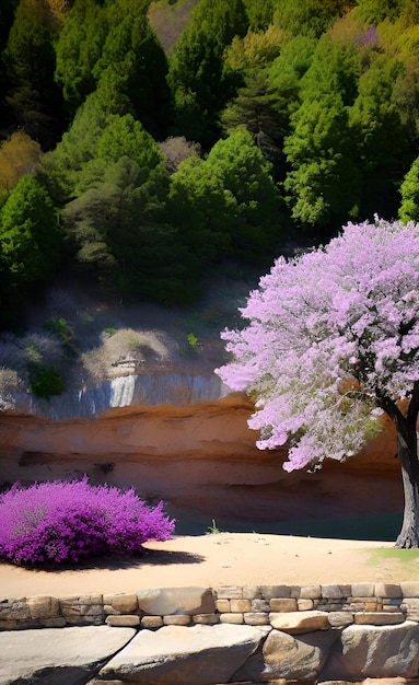 Un arbre avec des fleurs violettes au premier plan est entouré d'une cascade.