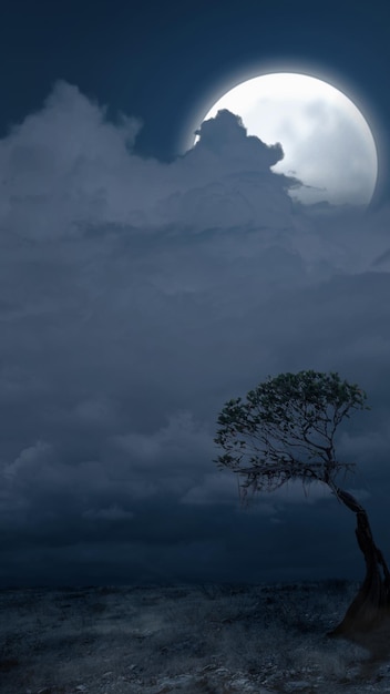 Arbre mort avec une lune pleine dans la nuit Concept de fond d'Halloween effrayant