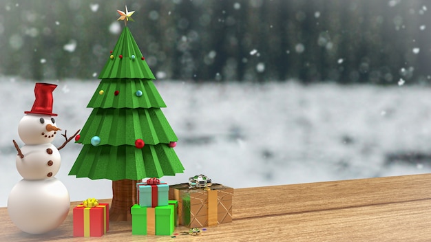 L'arbre de Noël et l'homme de neige sur la table en bois pour la célébration de vacances ou le rendu 3d de fond d'affaires de promotion