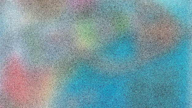 un arc-en-ciel est reflété sur une table en verre