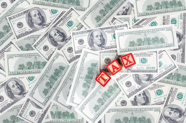 Photo l'argent, le dollar et le mot tax