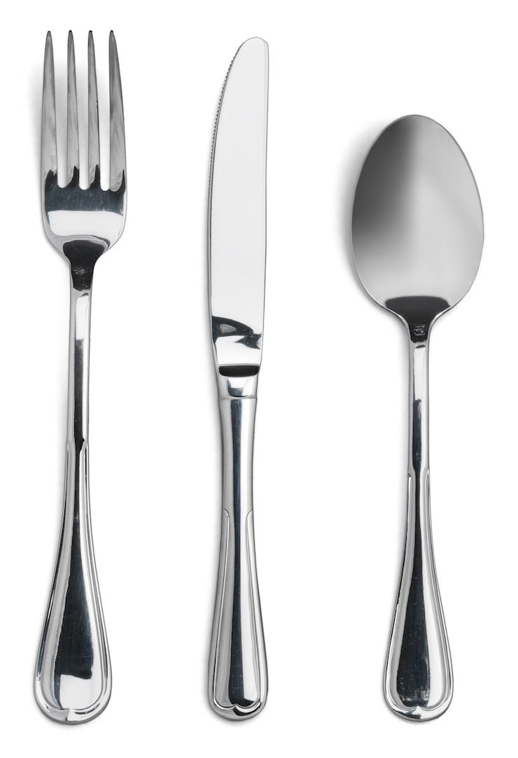 Photo argenterie. fourchette, cuillère et couteau isolated on white