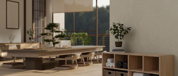 Une armoire en bois avec un espace de copie sur la table dans un salon zen japonais moderne