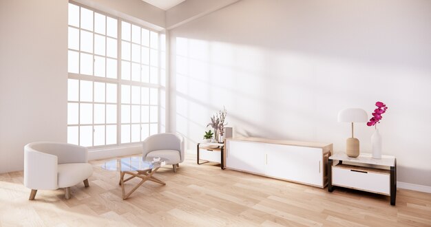 Armoire et fauteuil sur chambre avec mur blanc