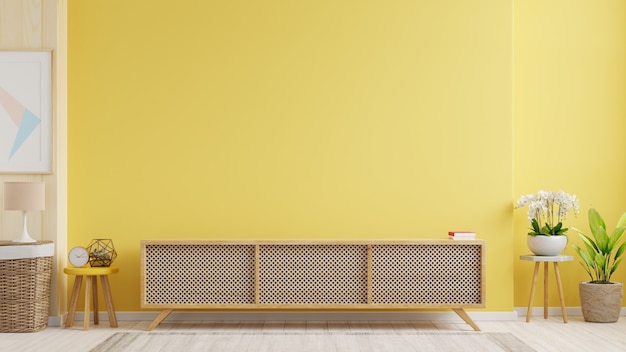 Armoire TV dans un salon moderne avec lampe, table, fleur et plante sur mur jaune, rendu 3d