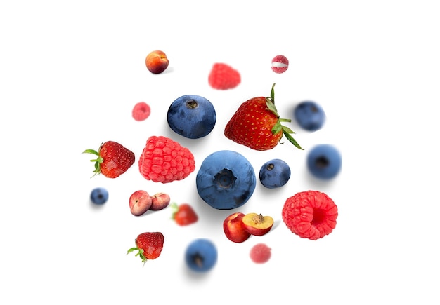 Un arrangement artistique de fruits mélangés sur un fond blanc
