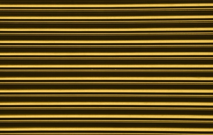 Photo arrière-plan abstrait de couleur dorée minimaliste la plus brillante pour des dessins élégants et élégants