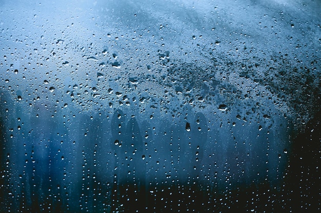 Arrière-plan abstrait Flou Gouttes de pluie sur la fenêtre