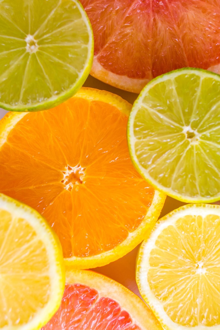 Photo arrière-plan alimentaire citrus colorés citrons citrons et citrons
