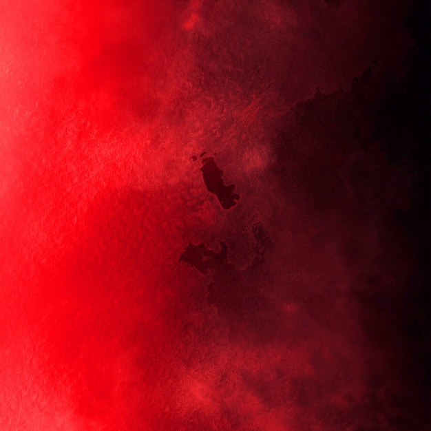Arrière-plan à l'aquarelle rouge