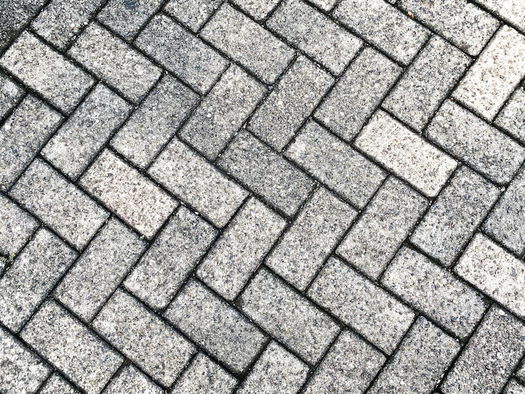 Photo arrière-plan de blocs de pavage en carreaux
