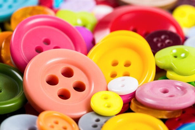 Arrière-plan de boutons colorés de différentes formes libre