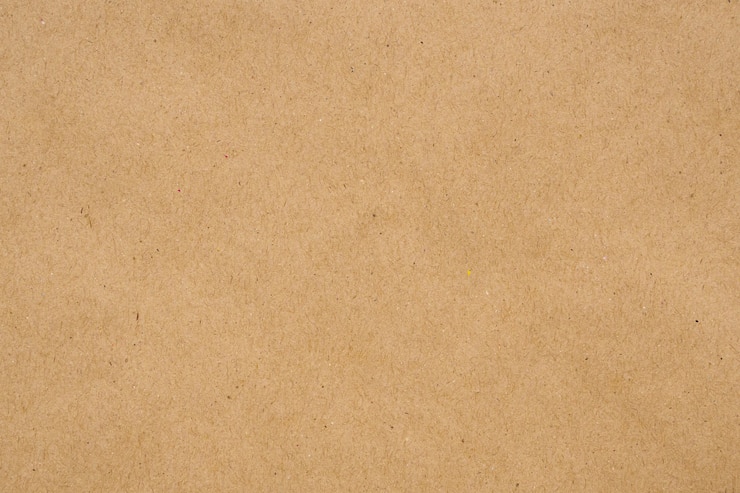 Photo arrière-plan en carton de texture de feuille de papier kraft recyclé écologique brun