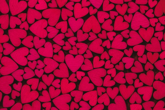 Photo arrière-plan de cœurs rouges en plein cadre décor en forme de cœur valentines arrière-plans de texture