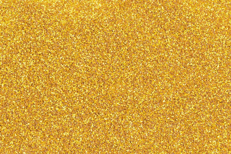 Photo arrière-plan étincelant à texture dorée