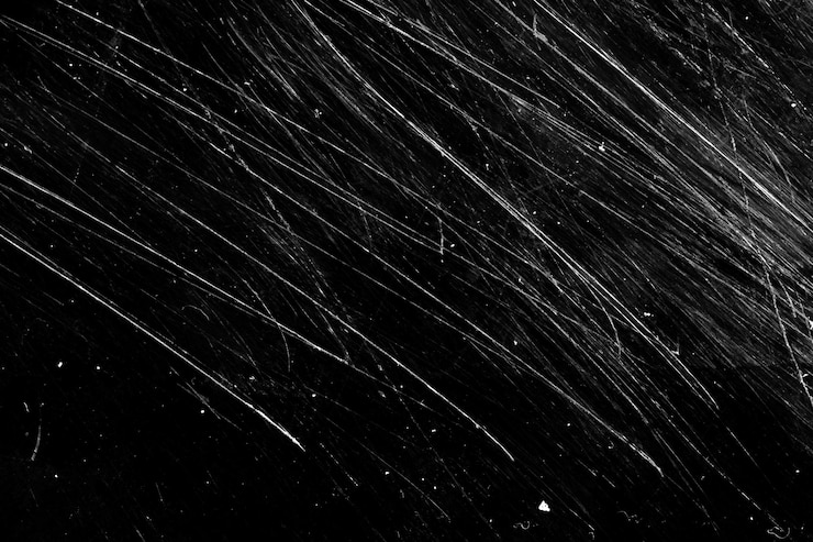 Photo arrière-plan grunge avec des rayures sur un fond noir