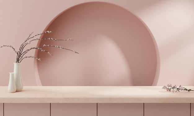 Arrière-plan minimal abstrait pour la présentation du produit avec fleur murale rose pastel et comptoir en bois.
