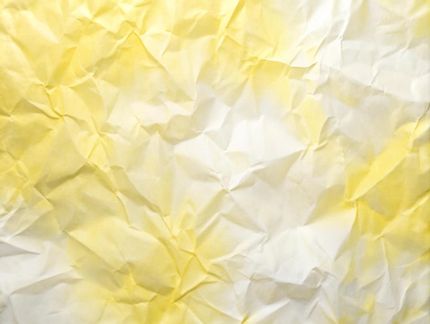 Arrière-plan de papier jaune froissé