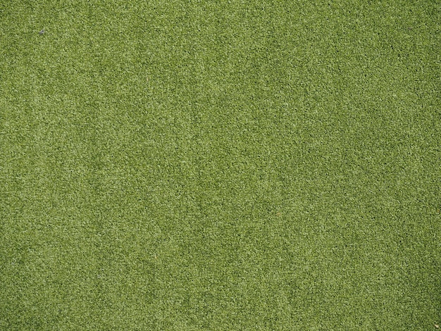 Arrière-plan de prairie d'herbe synthétique verte de style industriel
