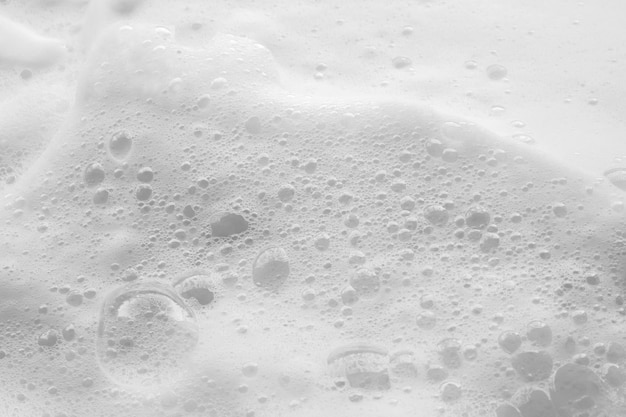 Arrière-plan de texture de bulles de mousse de savon blanc abstrait