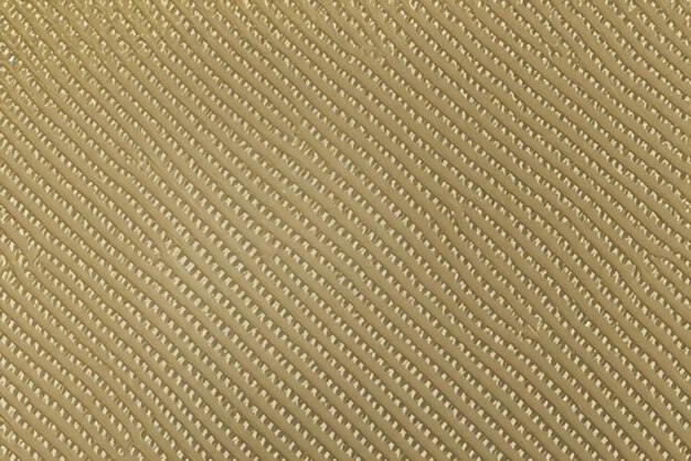 Arrière-plan de texture dorée avec couleur de maille de texture brillante et lisse pour le design graphique métallique