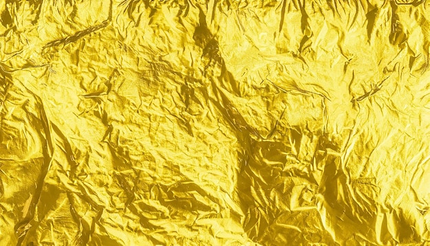 Arrière-plan à texture de feuille d'or jaune brillant