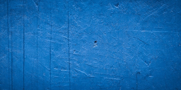 Arrière-plan de texture de mur bleu abstrait