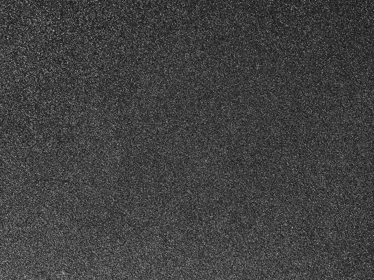 Photo arrière-plan à texture de papier abrasif noir