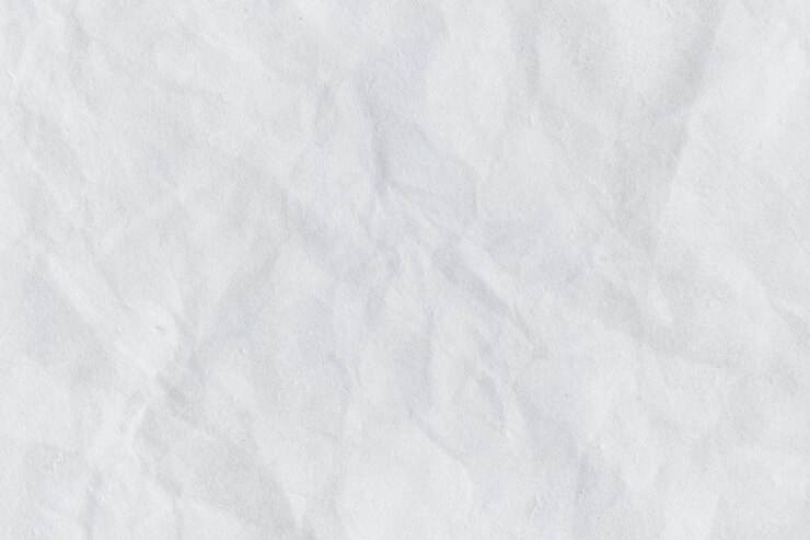 Photo arrière-plan à texture de papier blanchâtre froissé