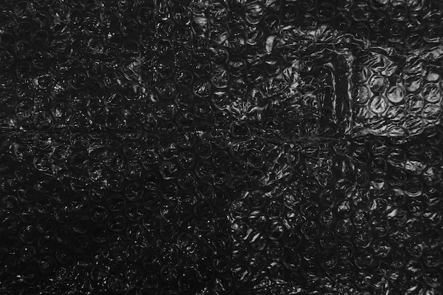 Arrière-plan de texture en plastique à bulles noires