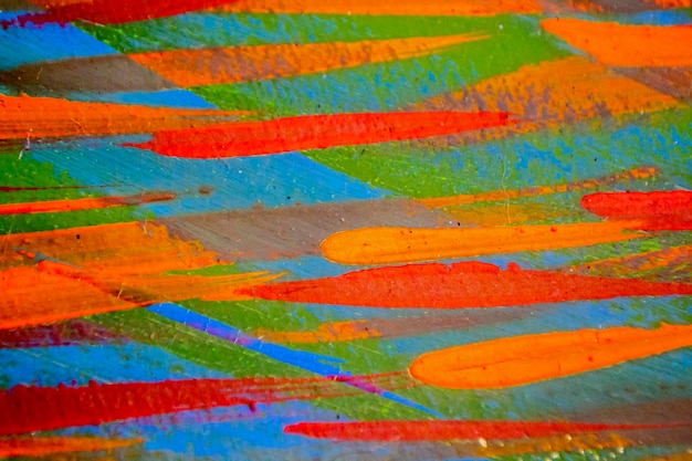 Arrière-plan varié et lumineux de lignes colorées de coups de pinceau réalisés avec de la peinture