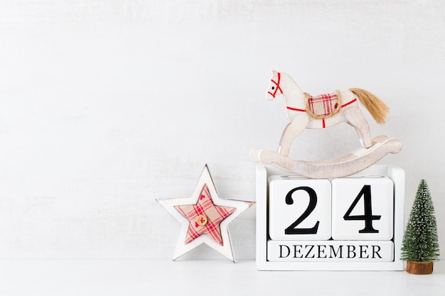 Arrière-plans de Noël Calendrier de Noël 24 décembre sur fond gris