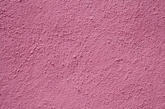 Arrière-plans et textures de ciment mur rose