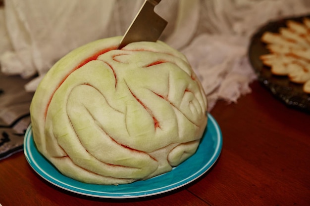 Art culinaire en sculpture de fruit de cerveau de pastèque pour un événement festif