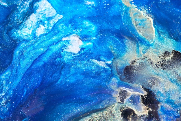 Art liquide de fond abstrait de luxe Encre d'alcool bleu avec des stries de peinture dorée texture de marbre de surface de l'eau