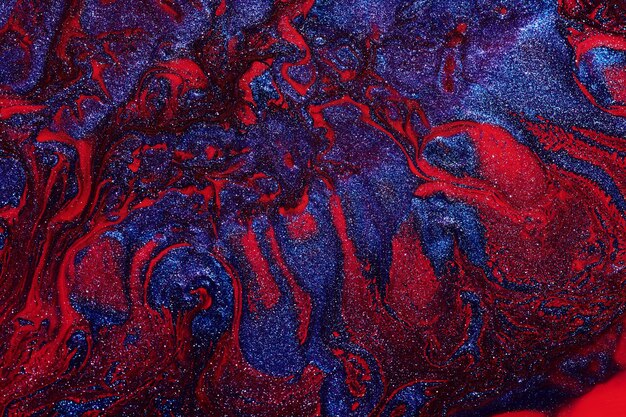 Art liquide de fond abstrait de luxe Mélange rouge bleu d'encre d'alcool avec des taches de peinture dorées Texture de marbre de surface de l'eau de la Terre