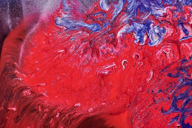 Art liquide de fond abstrait de luxe Mélange rouge bleu d'encre d'alcool avec des taches de peinture dorées Texture de marbre de surface de l'eau de la Terre