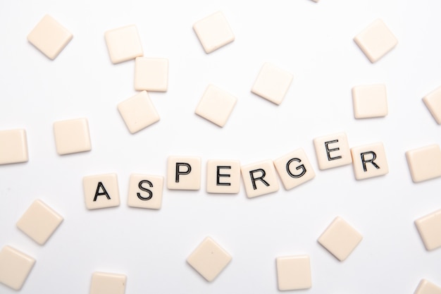 Asperger épelé en lettres