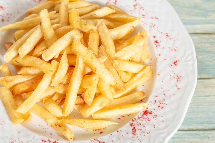 Photo assiette de frites au poivre paprika